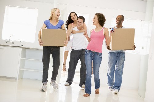 Removal team loading household items for a move in Pinner