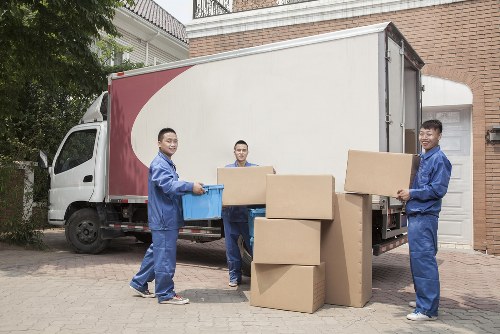 Removal van prepared for house removals in Pinner on a residential street