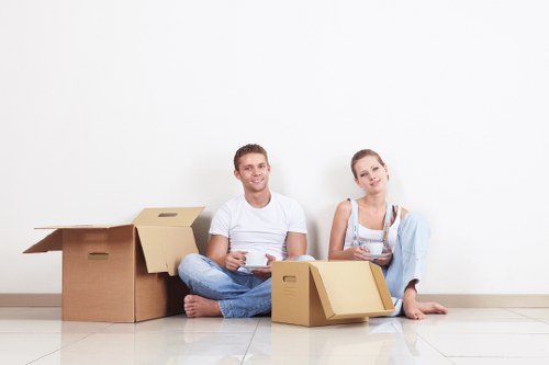 Removal vehicle and team handling access challenges on a local street