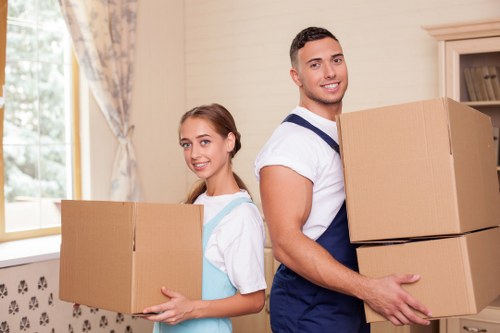 Loading boxes and furniture into a removal truck safely