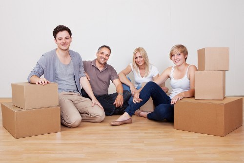 Unpacking and organising boxes inside a new home in Pinner