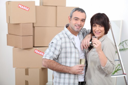 Commercial movers transporting office furniture in Pinner