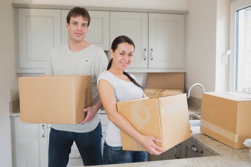 Packed office equipment ready for relocation in Pinner
